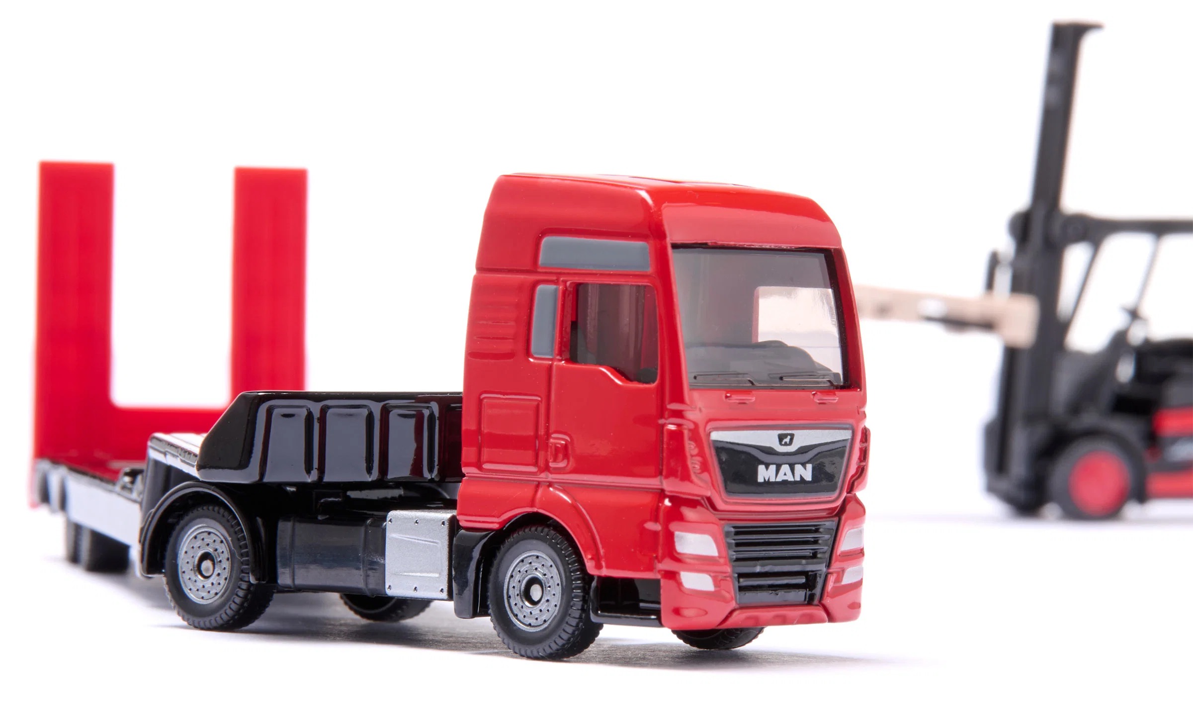 MAN LKW mit Linde Gabelstapler