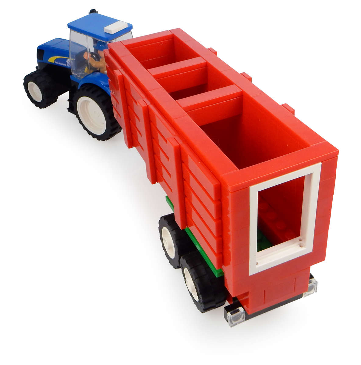 UH Kids New Holland Traktor mit Heuwagen Bausatz