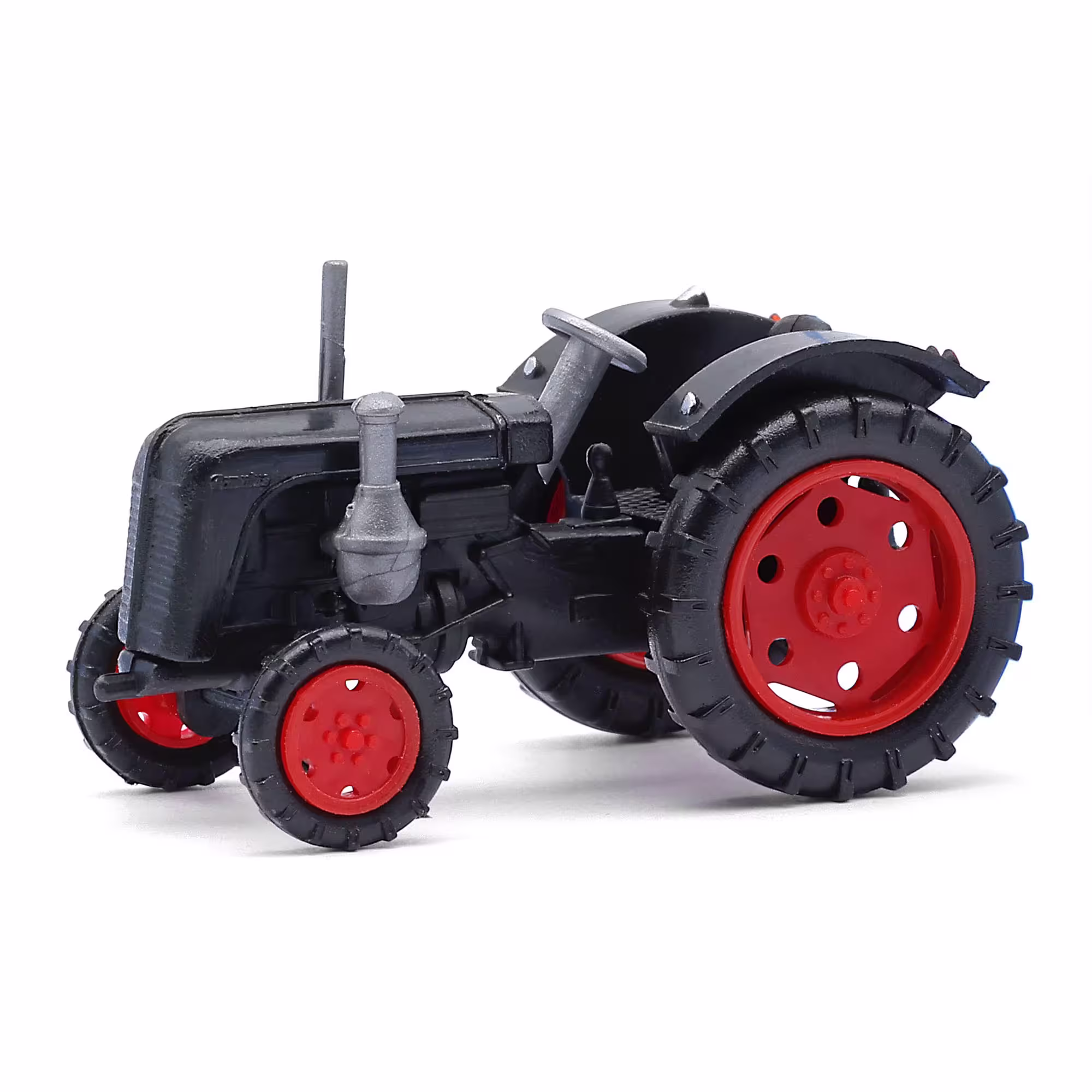 MA76407-1 Artikelname: Traktor Famulus, Schwarz mit roten Felgen Originalhersteller: Famulus von Mehlhose im Maßstab: 1:87 Hersteller-Nr: 210010104
