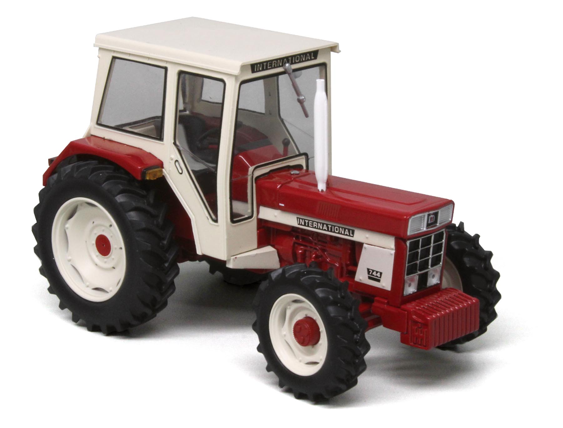 International 744 (4x4) mit Frontgewicht Modell von Replicagri 1:32