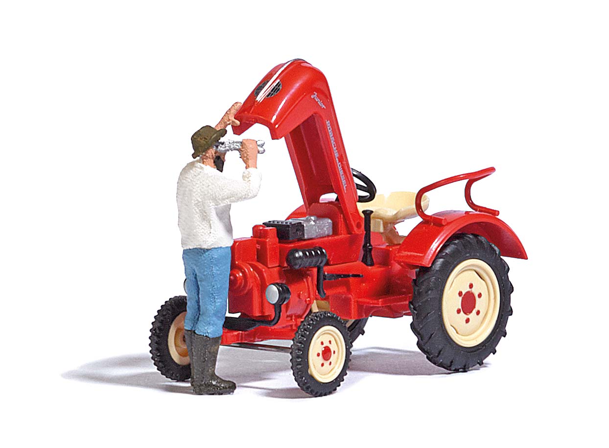 Traktorreparatur: Porsche mit Mechaniker Modell von Busch 1:87